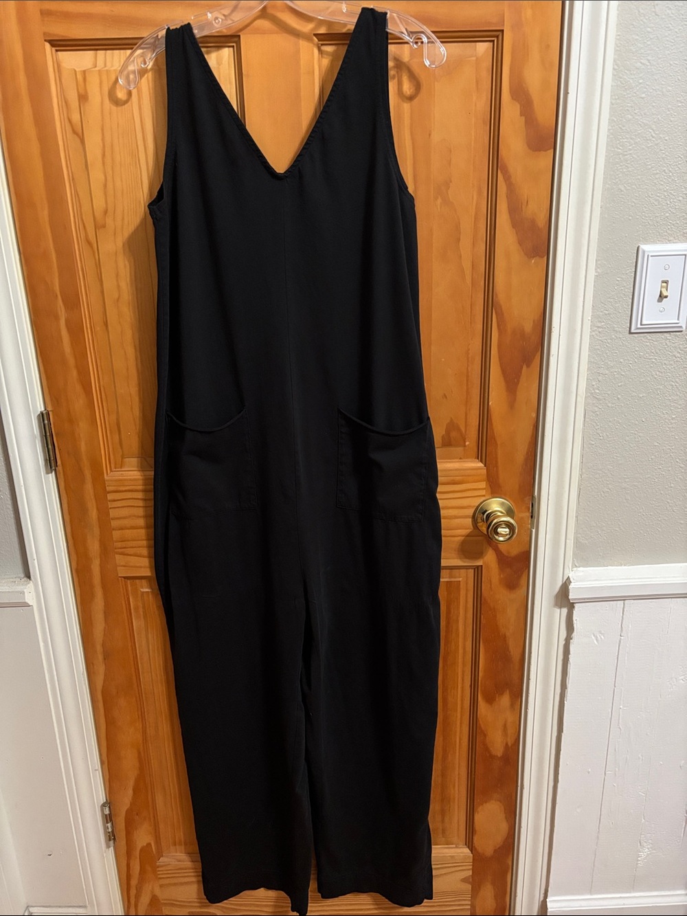 Pact Black V-Neck Sleeveless Jumpsuit with Front Pockets